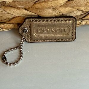Coach Vintage Metallic Gold/Brass Leather Hang tag